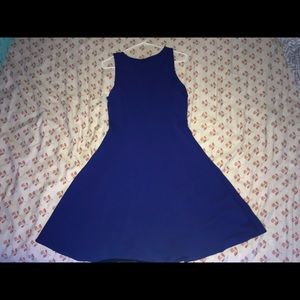 Blue “Love Andrea” dress.